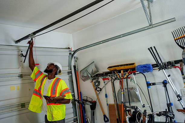 Professional Garage Door Roller Replacement technician working in Greensburg, IN